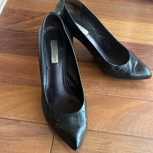 Croc black leather city-heel pumps.